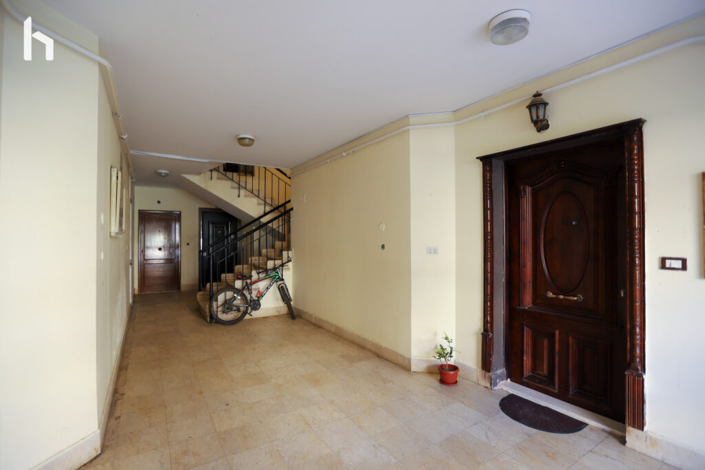 Central Apartment: Modern and secure living in the heart of Al Rehab City.