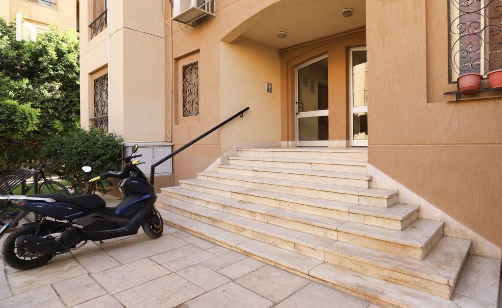 Central Apartment: Modern and secure living in the heart of Al Rehab City.