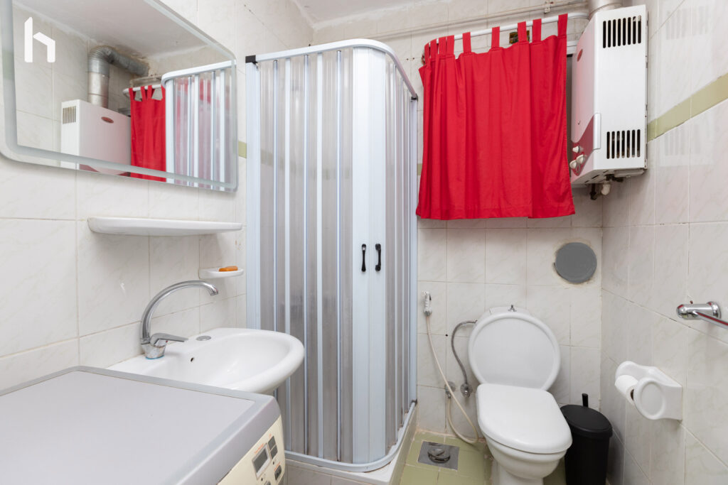 Relaxing bathroom retreat in your Al Rehab City apartment.