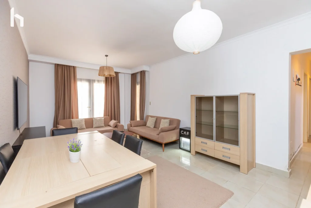Modern living space perfect for relaxing in your Al Rehab City serviced apartment.