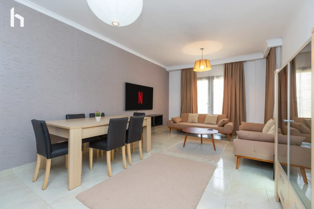Modern living space perfect for relaxing in your Al Rehab City serviced apartment.