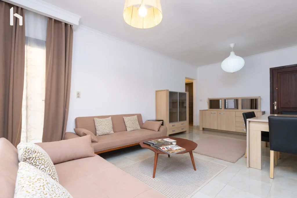 Modern living space perfect for relaxing in your Al Rehab City serviced apartment.